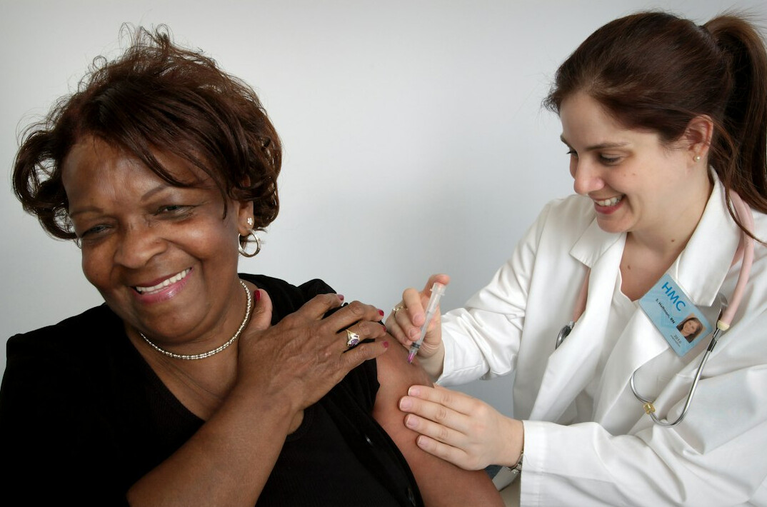 Nurse conducting a corporate health screening for an employee